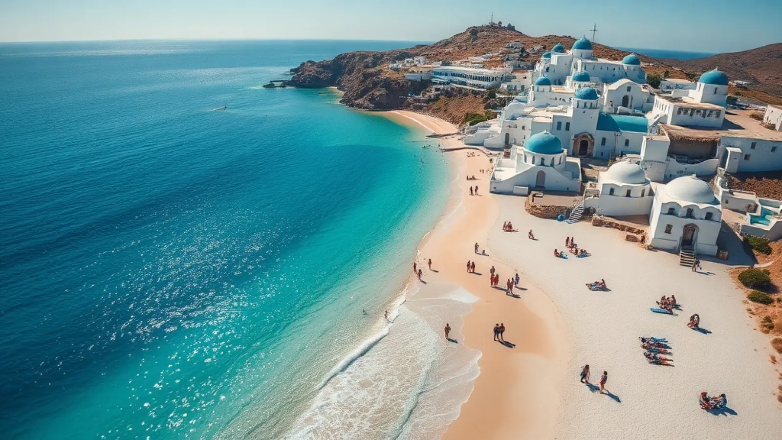 Tourists enjoying the crystal-clear waters and white-washed buildings of a Greek island village during peak summer season.
